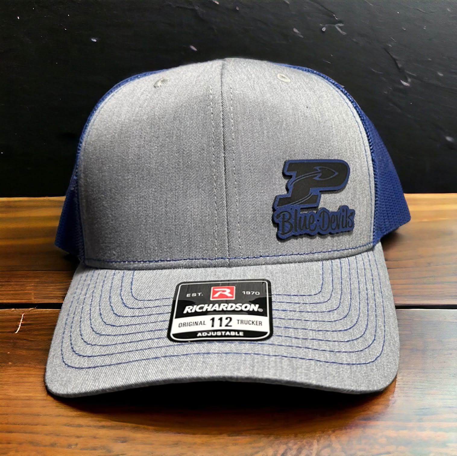 Heather grey and navy Richardson 112 with a navy Blue Devils P patch