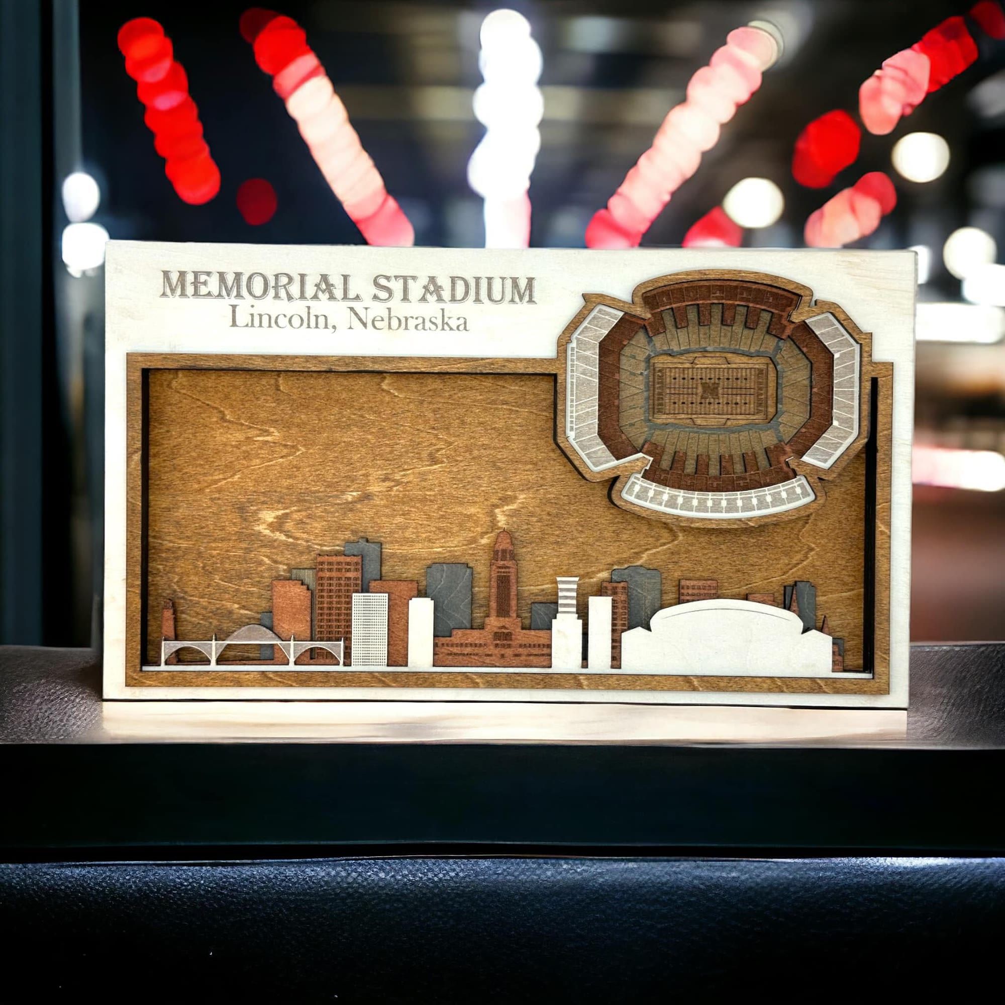Layered wood plaque of Memorial Stadium and the Lincoln, Nebraska skyline